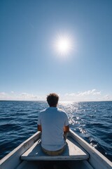 Fototapeta premium Young caucasian male in boat on open sea under bright sun.