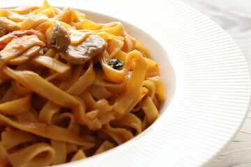 Creamy mushroom Mediterranean Italian Tagliatelle Pasta close up