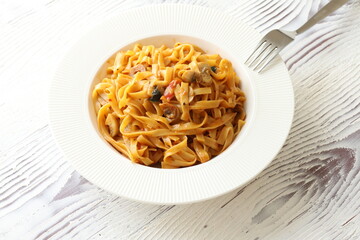 Creamy mushroom Mediterranean Italian Tagliatelle Pasta close up