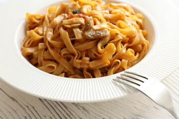 Creamy mushroom Mediterranean Italian Tagliatelle Pasta close up