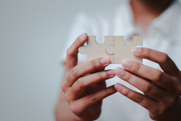 Business strategy puzzle solving office space visual content modern environment close-up view...