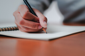 Business planning action crafting strategies at a workspace desk focused efficiency and growth