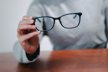 Business insights enhancing focus with glasses a professional setting indoor close-up clarity
