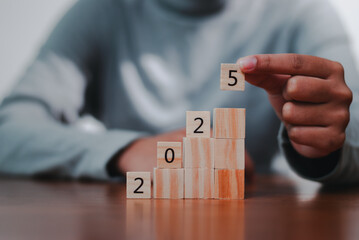 Business growth strategy tracking progress with blocks office environment motivational concept