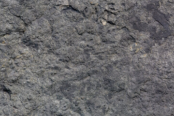 Macro stone detail texture,Black slate stone texture background,Dark rough natural rock texture background 