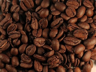 coffee beans background, fresh home roasted coffee beans. Medium roast
