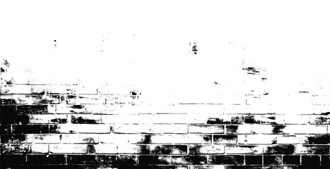 A black and white image of a brick wall with some damage and fading into white at the top portion