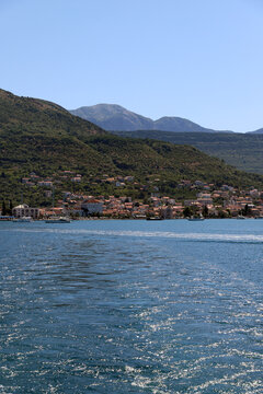 Panorama of the city of Tivat, Montenegro. Sea, mountains, embankment, port, ships, boats