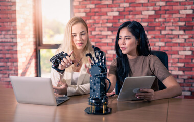 Mechanical engineering team working in robotic technology lap for research and develop for...