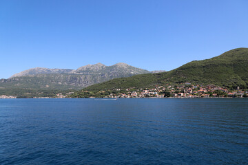 mountain village in the fjords of Montenegro. Bay of Kotor. Horizontal photo