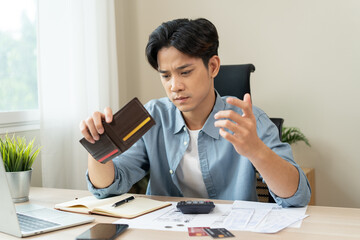 Stressed bankrupt financial crisis concept, Young adult in nervous after calculated loan expense...
