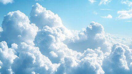 Fluffy cumulus clouds against a vibrant blue sky.
