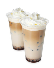 Tasty milk bubble tea in plastic cups isolated on white