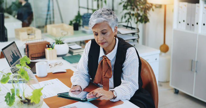 Mature woman, tablet and review results at office for metadata analysis, charts and app at company. Person, tech and scroll with feedback for finance statistics, solution or problem solving at agency