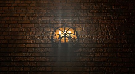 Dim wall lamp with soft yellow light on rough red brick wall in dark rustic interior. Vintage...