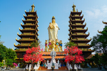 Majestic Quan Am Statue and Twin Pagodas at a Buddhist Temple in Mui Ne, Vietnam