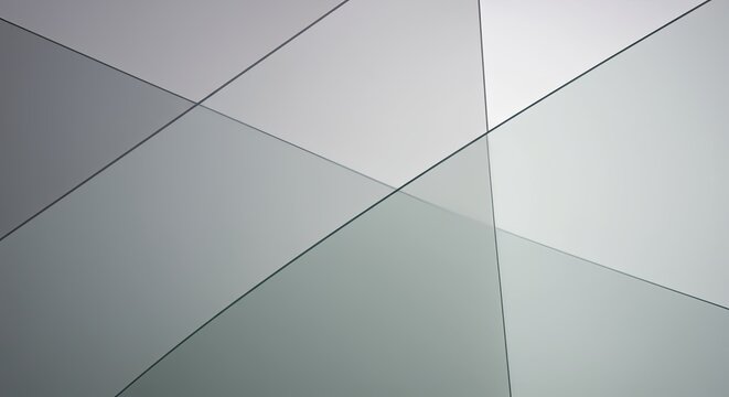 Subtle grey glass panels overlap in a contemporary geometric design