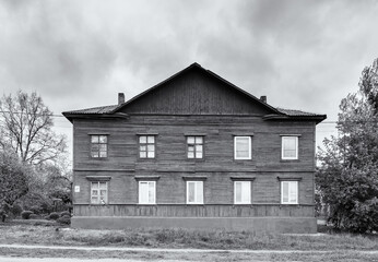 Wooden old barrack-type house, old housing in a big city