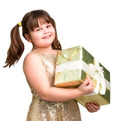 A smiling girl, standing with a gift box in her hands, isolated on transparent cutout background. A girl in a festive golden dress with present.