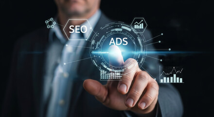 Obraz premium Businessman touches glowing holographic screen showing SEO, ads, global e-commerce, and digital marketing analytics, symbolizing online promotion strategy and global sales.