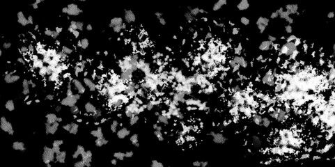 White snowflakes on a black background surface. Macro nature pattern backdrop. Snow overlay background isolated on black. Winter concept. scratches and cracks which can be used as a background.