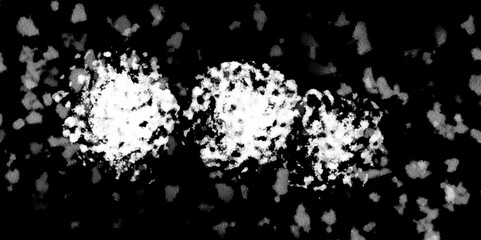 White snowflakes on a black background surface. Macro nature pattern backdrop. Snow overlay background isolated on black. Winter concept. scratches and cracks which can be used as a background.