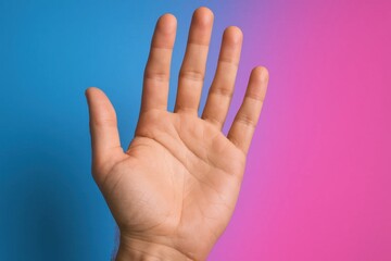A Hand Reaching Out Against a Colorful Backdrop
