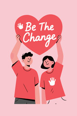 Be The Change message held by two people in red shirts heart love positivity teamwork unity inspiration motivation community care sharing support volunteer charity activism social good