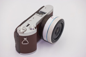 Compact digital camera featuring sleek design and unique color combination, suitable for...