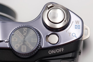 Close up view of a camera control panel with buttons and settings in a studio setting during daylight hours