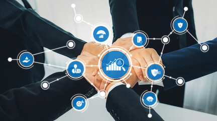 Office worker team stacking hand together symbolize successful group of business partnership and strong collective unity teamwork in community workplace in panoramic banner. Shrewd Amity