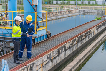 Environmental engineers work at wastewater treatment plants,Water supply engineering working at...