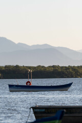 boat anchored in the south bay in florianopolis santa catarina brazil