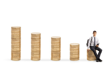College student with books sitting on a pile of coins
