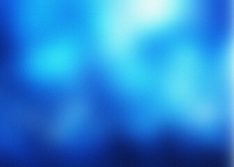 Abstract blue gradient background with subtle noise texture and soft light effect