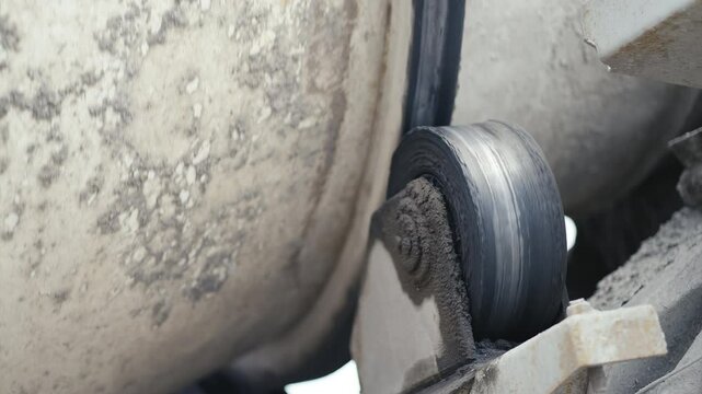 A dynamic view of an advanced concrete mixer truck showcasing its movement, efficiency, and functionality