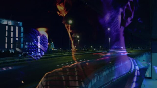 Male singer bringing mic to mouth and singing with highway projection showing night music mood