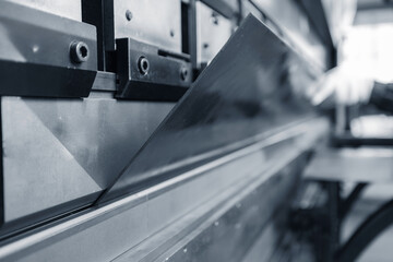 Close-up of sheet metal bending in industrial factory