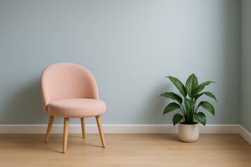 Peach upholstered chair with green plant against pale blue wall image