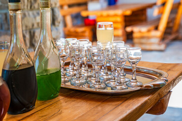 Small empty glasses for wine tasting set up on a table