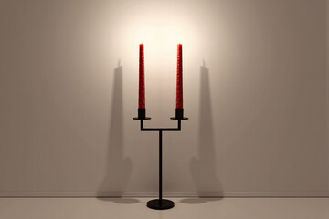 Elegant black metal candelabrum holding three tall red candles, casting warm, dramatic light and deep shadows against neutral wall for romantic or formal occasion