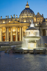 Obraz premium St. Peter's Basilica with fountain in the foreground at dusk. Vatican. Rome. Italy. Vertically. 