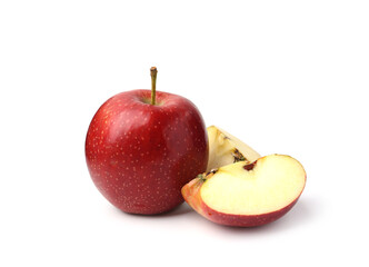 Whole and cut red apples isolated on white