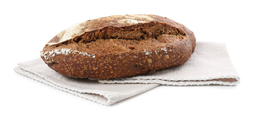 Loaf of rye bread and towel isolated on white
