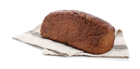 Loaf of rye bread and towel isolated on white
