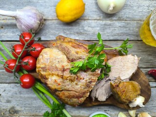 the tenderest fried piece of meat lies on a sliced board