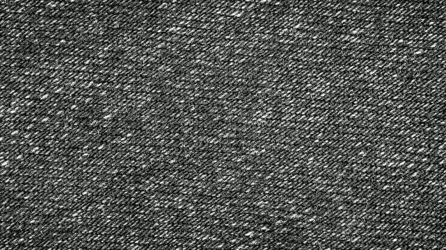 black jeans with an interesting texture visible. background