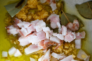 Pan with seasoning to prepare beans