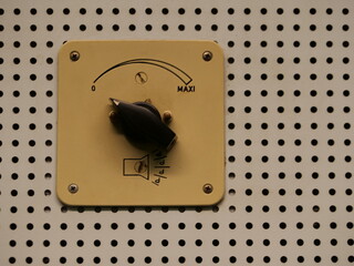 Switch with a black knob on it