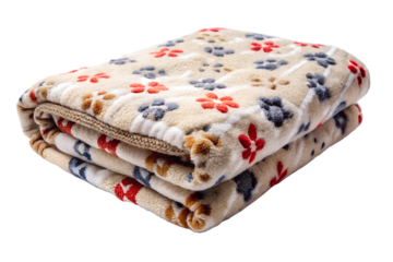 A folded beige blanket with a red and blue floral pattern is shown isolated on transparent background